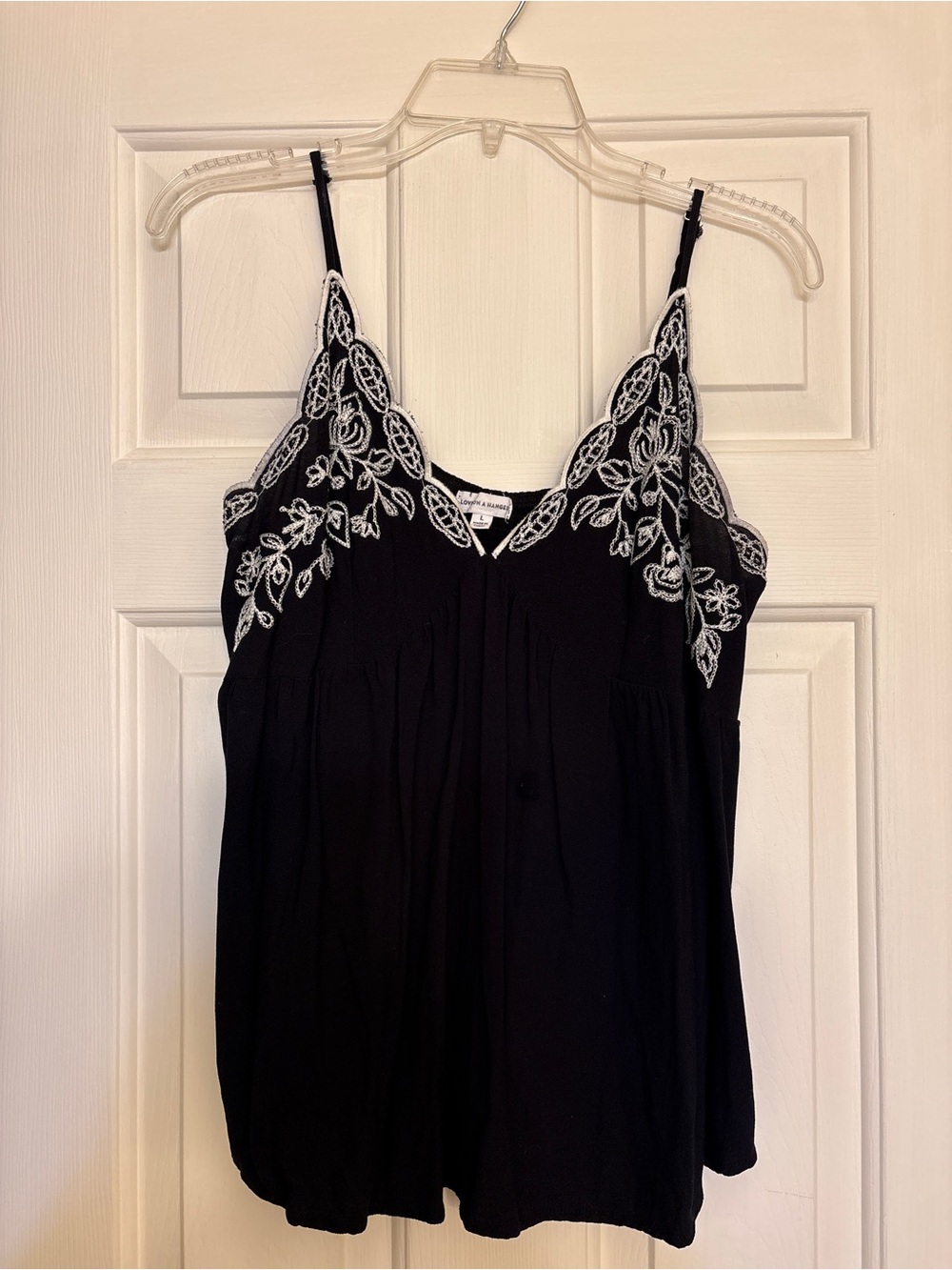 Black flowy cami tank.Size L. Great condition.
